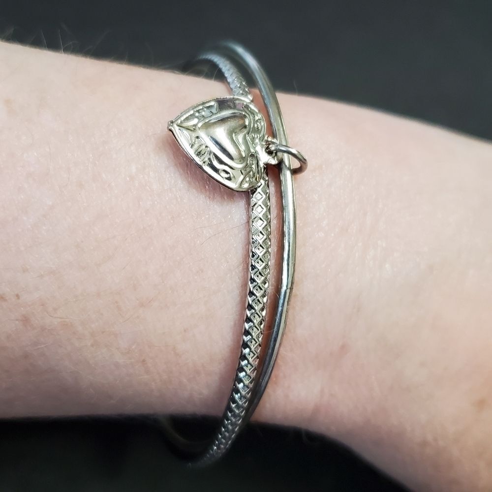 Silver tone double bangle with heart charm 8"